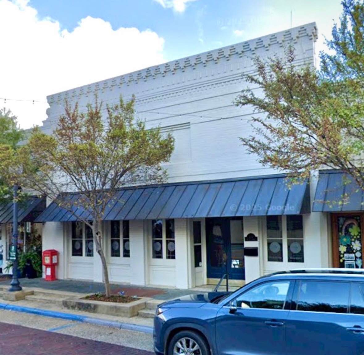Phoenix Rising storefront on Jefferson Street in Olde Towne Clinton